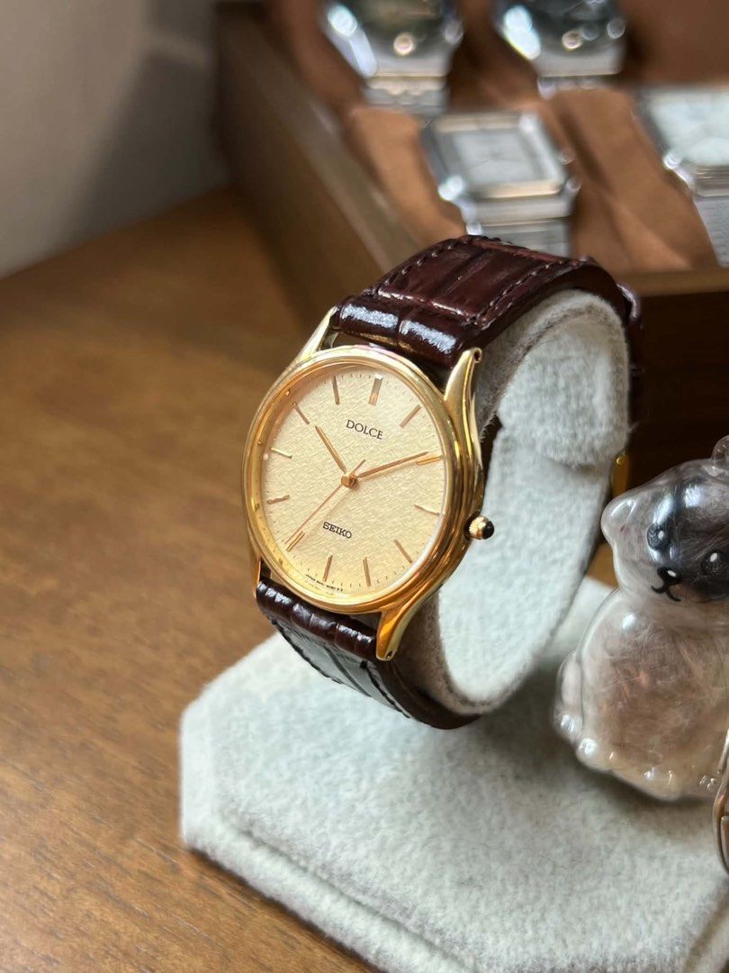 1985 Seiko Dolce Quartz (Category: Men's Watches) located in Makati City. Submitted by mheegan_yadao (Listing ID 1461732226, Image 2). Description: 1985 Seiko Dolce Quartz Vintage Seiko Dolce Quartz Dress Watch Ref. 8N41-6060 | Circa 1985 • Made in Japan 🇯🇵 • Seiko Cal. 8N41 Quartz Movement • Elegant Champagne/Gold-Tone Textured Dial • Gold-Tone Case • Classic Applied Hour Markers • Brown Leather Strap • Stainless Steel Back • SGP 30 • Water Re