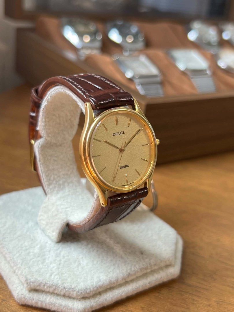 1985 Seiko Dolce Quartz (Category: Men's Watches) located in Makati City. Submitted by mheegan_yadao (Listing ID 1461732226, Image 3). Description: 1985 Seiko Dolce Quartz Vintage Seiko Dolce Quartz Dress Watch Ref. 8N41-6060 | Circa 1985 • Made in Japan 🇯🇵 • Seiko Cal. 8N41 Quartz Movement • Elegant Champagne/Gold-Tone Textured Dial • Gold-Tone Case • Classic Applied Hour Markers • Brown Leather Strap • Stainless Steel Back • SGP 30 • Water Re