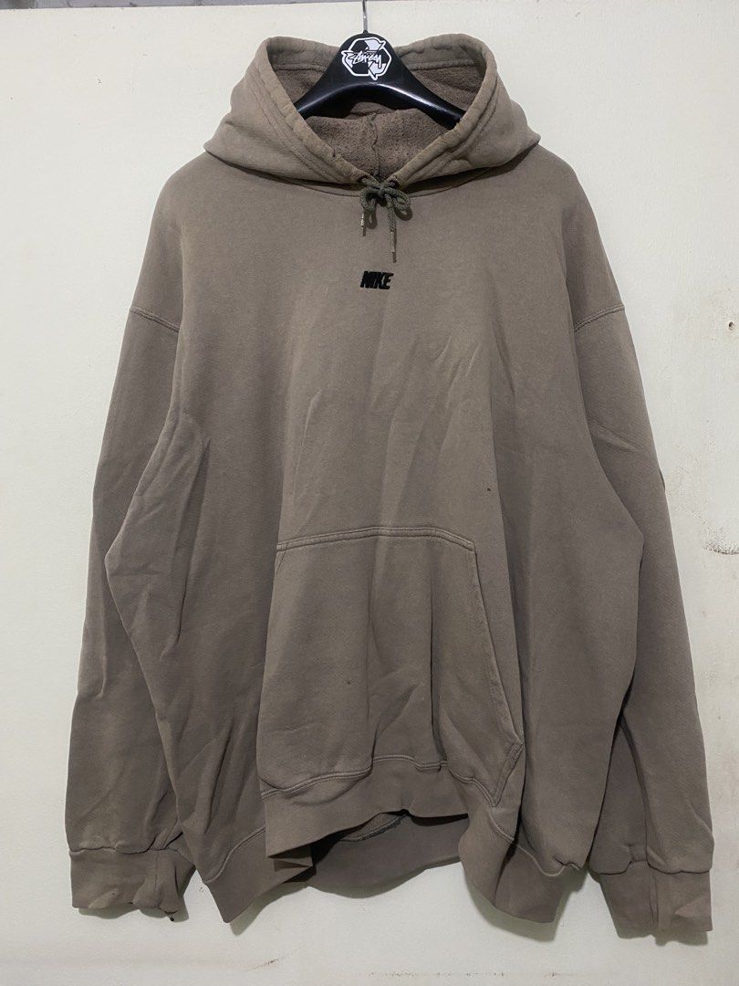 2000s Nike Hoodie (Category: Coats, Jackets and Outerwear) located in Quezon City. Submitted by rockyroadzz (Listing ID 1461601955, Image 1). Description: - Brown Nike hoodie - Size XXL - Small embroidered Nike logo on chest - Front kangaroo pocket - Drawstring hood - Made in Mexico - Minor marks on fabric - 27x27 - Boxy fit.