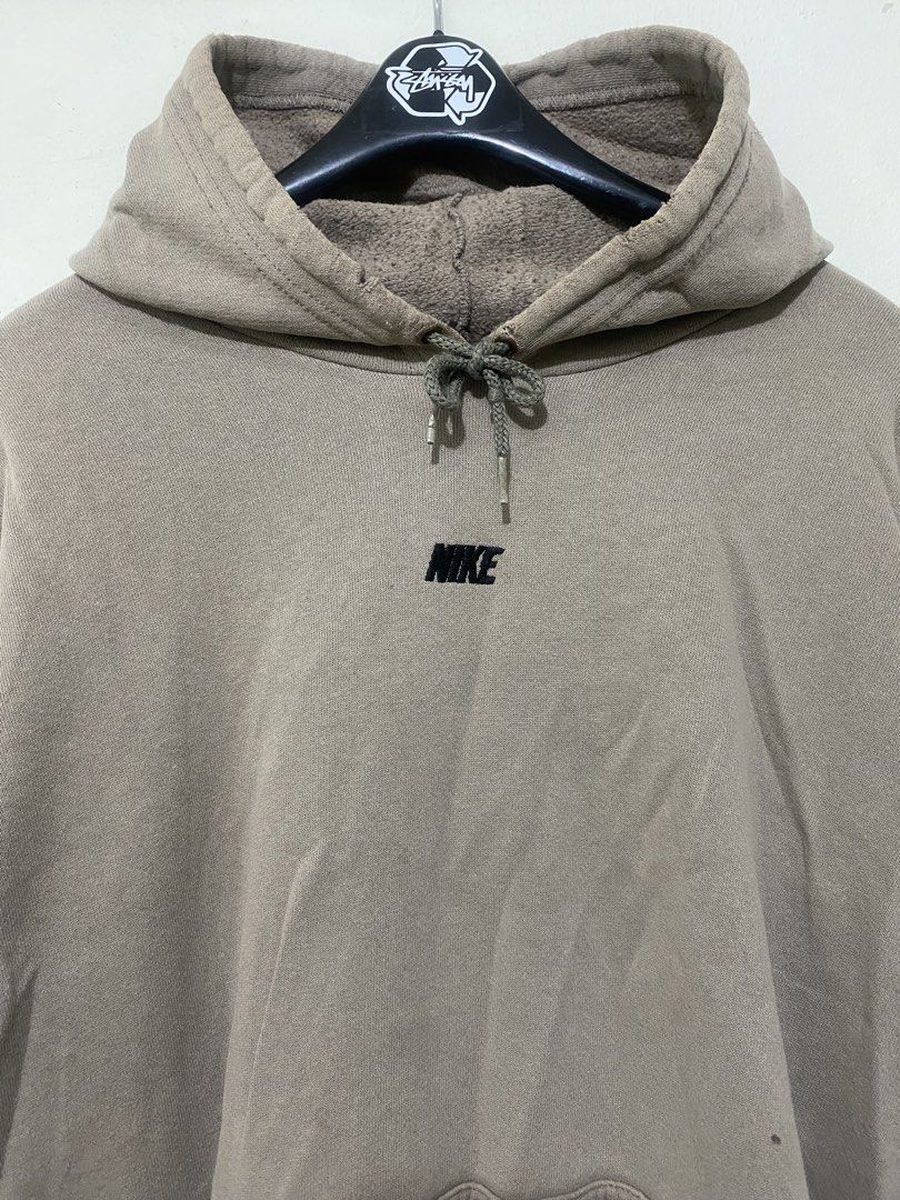 2000s Nike Hoodie (Category: Coats, Jackets and Outerwear) located in Quezon City. Submitted by rockyroadzz (Listing ID 1461601955, Image 2). Description: - Brown Nike hoodie - Size XXL - Small embroidered Nike logo on chest - Front kangaroo pocket - Drawstring hood - Made in Mexico - Minor marks on fabric - 27x27 - Boxy fit.