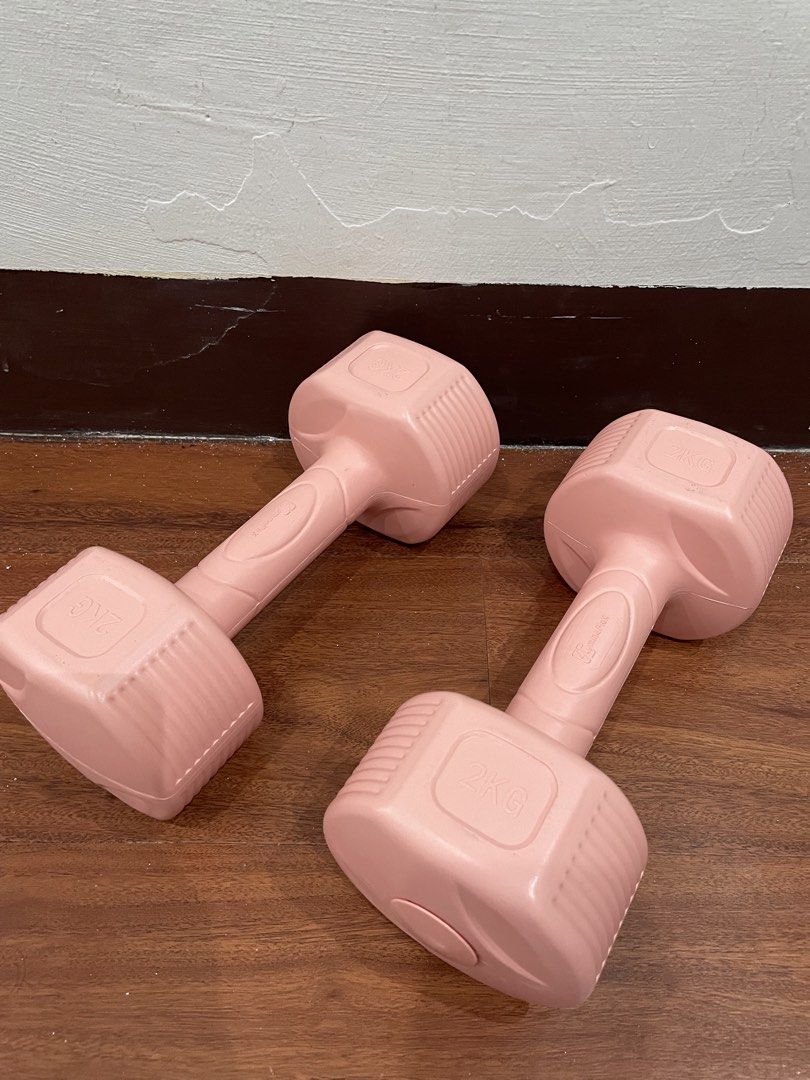 2KG Pink Dumbbells (Pair) (Category: Weights & Dumbbells) located in Quezon City. Submitted by mugs.meowph (Listing ID 1461588147, Image 1). Description: - Set of two (2) pink dumbbells - Each dumbbell weighs 2KG - Ideal for home workouts - Great for toning arms and upper body - Cute and fun pink color - Easy and comfortable to grip.