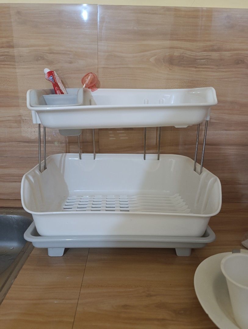 2-Tier Dish Rack with Utensil Holder (Category: Other Kitchenware & Tableware) located in Manila. Submitted by oscera (Listing ID 1461563708, Image 2). Description: - Two-tier design for maximum drying space. - Separate compartment for cutlery and utensils. - Removable bottom tray to catch water and keep counters dry. - Simple assembly and disassembly for easy cleaning. - Ideal for small kitchens, apartments, or dorm rooms..