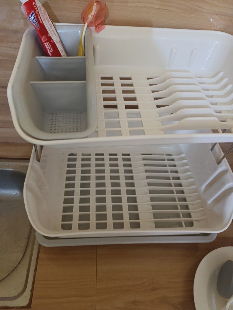 2-Tier Dish Rack with Utensil Holder (Category: Other Kitchenware & Tableware) located in Manila. Submitted by oscera (Listing ID 1461563708, Image 1). Description: - Two-tier design for maximum drying space. - Separate compartment for cutlery and utensils. - Removable bottom tray to catch water and keep counters dry. - Simple assembly and disassembly for easy cleaning. - Ideal for small kitchens, apartments, or dorm rooms..