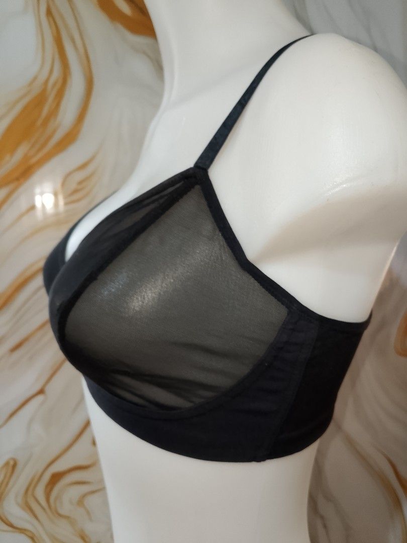 34-36 b/c Black Mesh Triangle Bralette not padded nonwire (Category: Undergarments & Loungewear) located in Manila. Submitted by truecrystal-1407 (Listing ID 1461656913, Image 2). Description: - Sheer black mesh bralette - Triangle cups - Soft band for comfort - Adjustable straps - Hook-and-eye back closure - Versatile for everyday wear or layering.