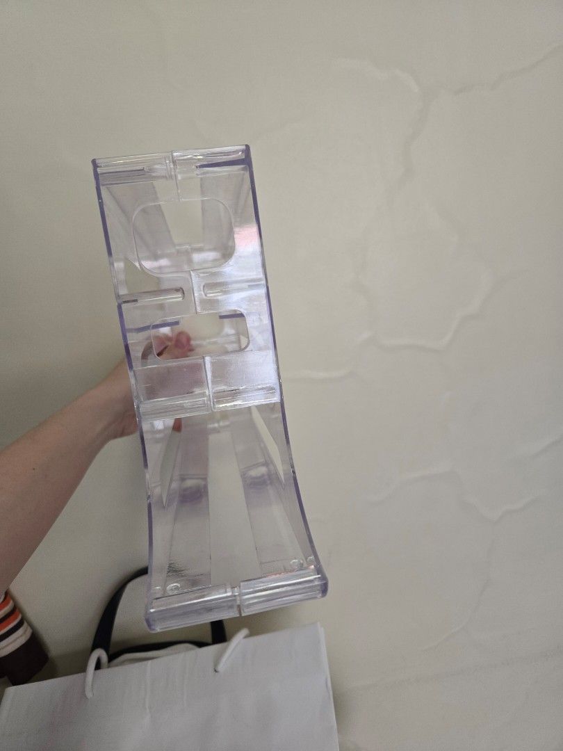 4 tier egg roller dispenser (Category: Other Kitchenware & Tableware) located in Manila. Submitted by chocomoose (Listing ID 1461584851, Image 2). Description: new but putol yung isang paa. pwede idikit or remove other paa para pumantay ang tayo. orig price 280. now 80pesos only.