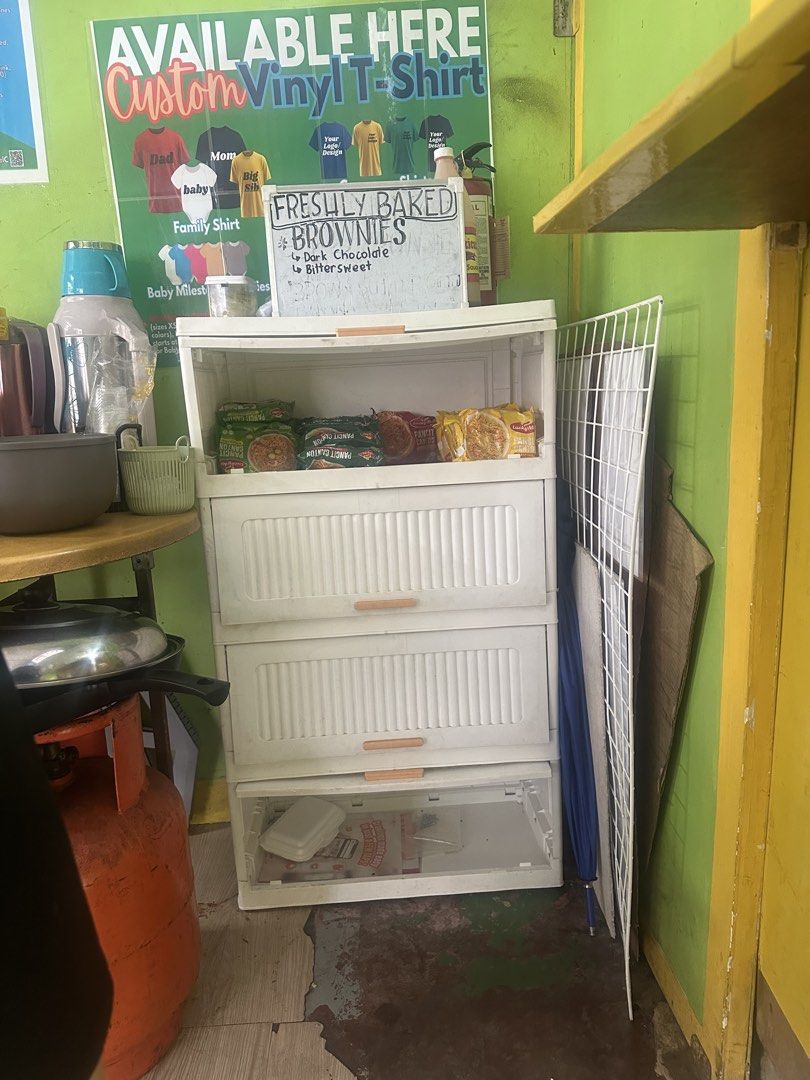 4-Tier Stackable Storage Cabinet with Drawers (Category: Shelves, Cabinets & Racks) located in Manila. Submitted by zuripot0726 (Listing ID 1461714854, Image 3). Description: - White plastic storage cabinet with 4 drawers - Each drawer features a stylish wooden handle - Perfect for organizing small items, snacks, or supplies - Drawers are stackable and can be easily removed - Simple to clean and convenient to move around - Versatile for home or s