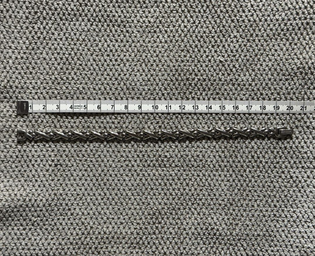 ✨ Germanium & Titanium Wellness Bracelet – Silver Tone ✨ (Category: Jewelry) located in Bacarra. Submitted by retrovival (Listing ID 1461587776, Image 1). Description: ✨ Germanium & Titanium Wellness Bracelet – Silver Tone ✨ A sleek silver-tone link bracelet with a bold geometric design, stamped “TITANIUM” and “GERMANIUM” on the clasp. The bracelet features several small round germanium-style inserts incorporated into the links, giving it that cl
