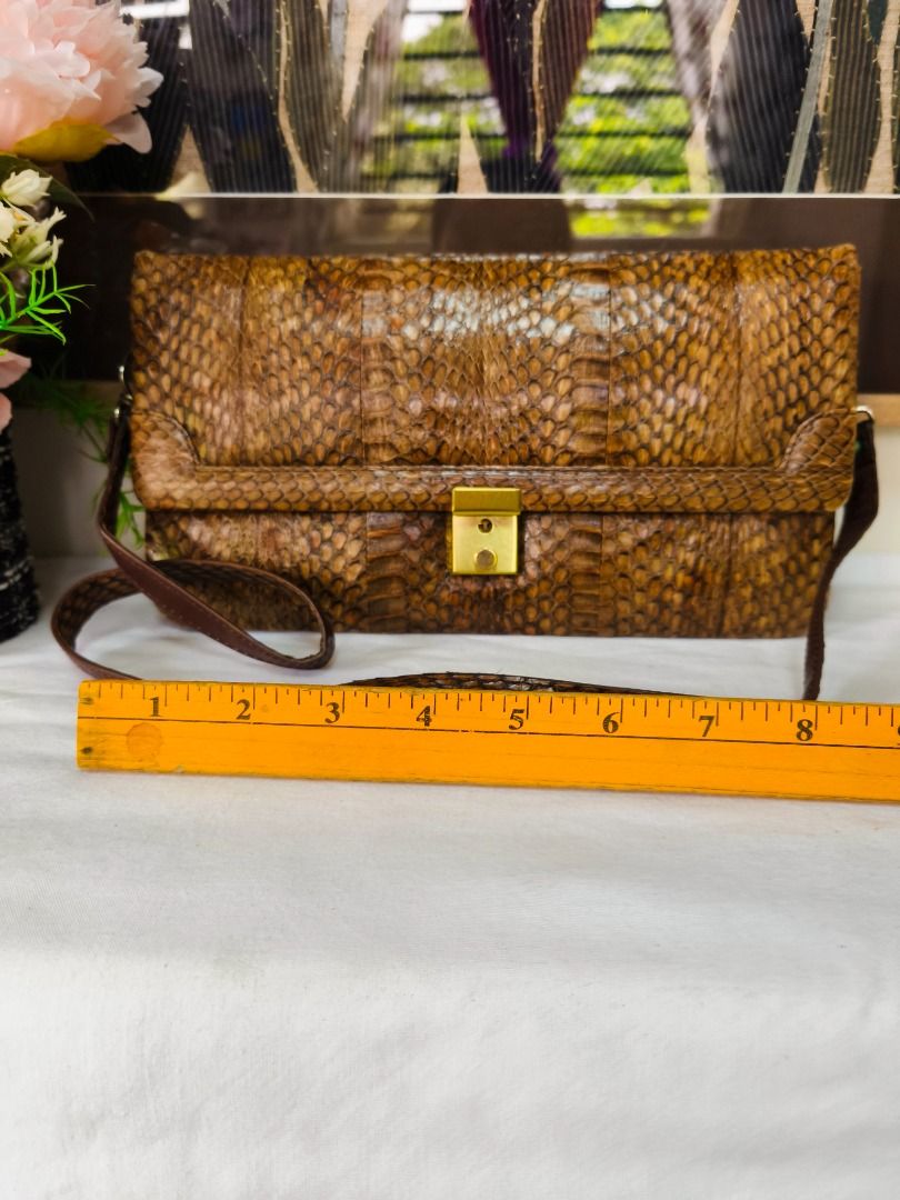 ✨ JAPAN IMPORT | GENUINE PYTHON SNAKESKIN SLING BAG✨ No. 28 (Category: Cross-body Bags) located in Valenzuela. Submitted by sakura_japan_surplus (Listing ID 1461643609, Image 3). Description: ✨ JAPAN IMPORT | GENUINE PYTHON SNAKESKIN SLING BAG ✨ LIKE NEW / • Original attachments and Japanese care instruction tag are still intact 💰 payday sale PRICE: ₱650 ONLY! from 750 🔥 Beautiful genuine python snakeskin sling wallet in elegant natural cream, 