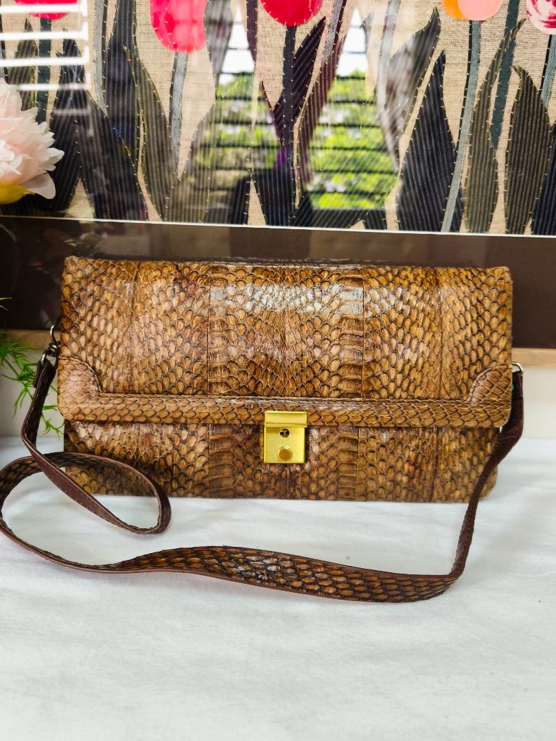✨ JAPAN IMPORT | GENUINE PYTHON SNAKESKIN SLING BAG✨ No. 28 (Category: Cross-body Bags) located in Valenzuela. Submitted by sakura_japan_surplus (Listing ID 1461643609, Image 1). Description: ✨ JAPAN IMPORT | GENUINE PYTHON SNAKESKIN SLING BAG ✨ LIKE NEW / • Original attachments and Japanese care instruction tag are still intact 💰 payday sale PRICE: ₱650 ONLY! from 750 🔥 Beautiful genuine python snakeskin sling wallet in elegant natural cream, 