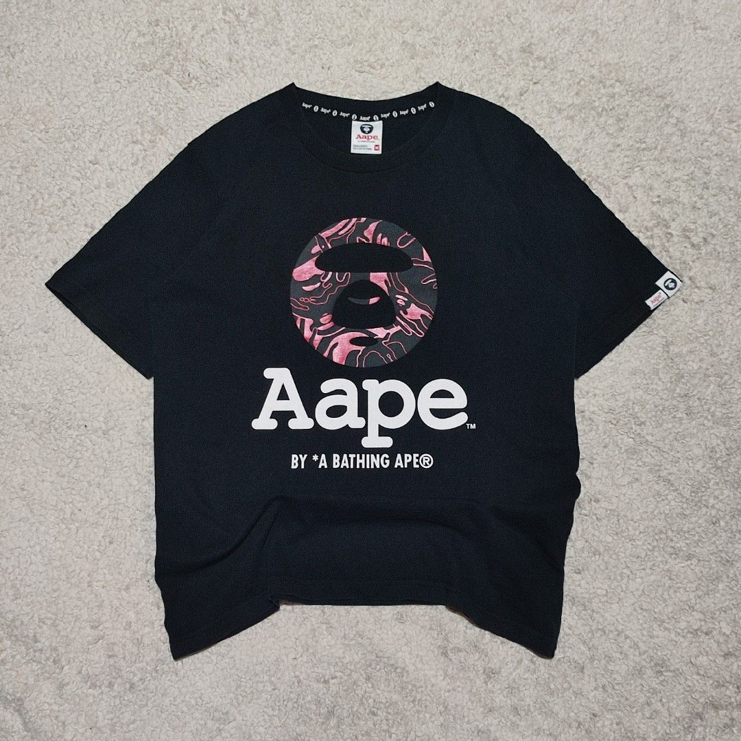 Aape UNVS Moonface Graphic Tee (Category: Tshirts & Polo Shirts ) located in Manila. Submitted by anthonyg01 (Listing ID 1461665419, Image 1). Description: Length: 26 inches Width: 19 inches Price: 800 pesos negotiable Condition: 9/10 Issues: last 2 photos PM if interested or for inquiries Meetups within MANILA only Can do shipping at buyers expense .
