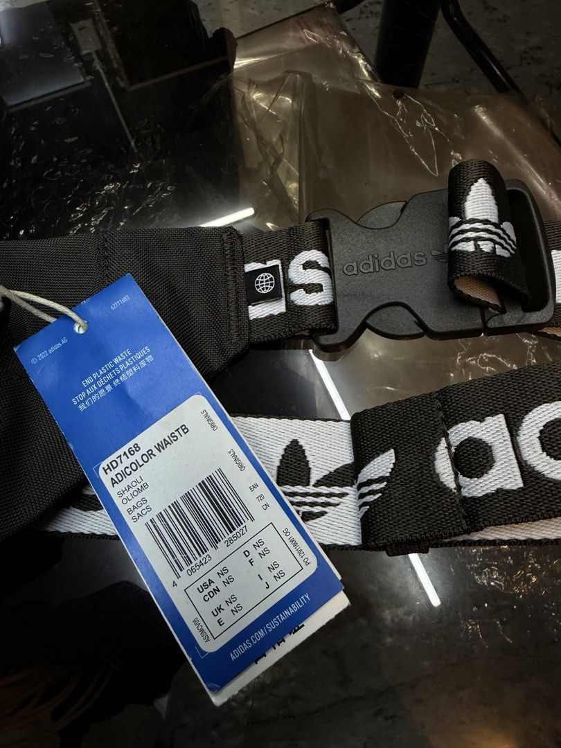 Adidas Adicolor Waist Bag Black (Category: Belt bags, Clutches and Pouches) located in Manila. Submitted by raven236 (Listing ID 1461747302, Image 3). Description: - Classic Adidas waist bag - Features iconic trefoil logo and 3-stripes branding - Adjustable strap with secure buckle closure - Crafted from durable recycled polyester - Ideal for carrying your essentials on the go.