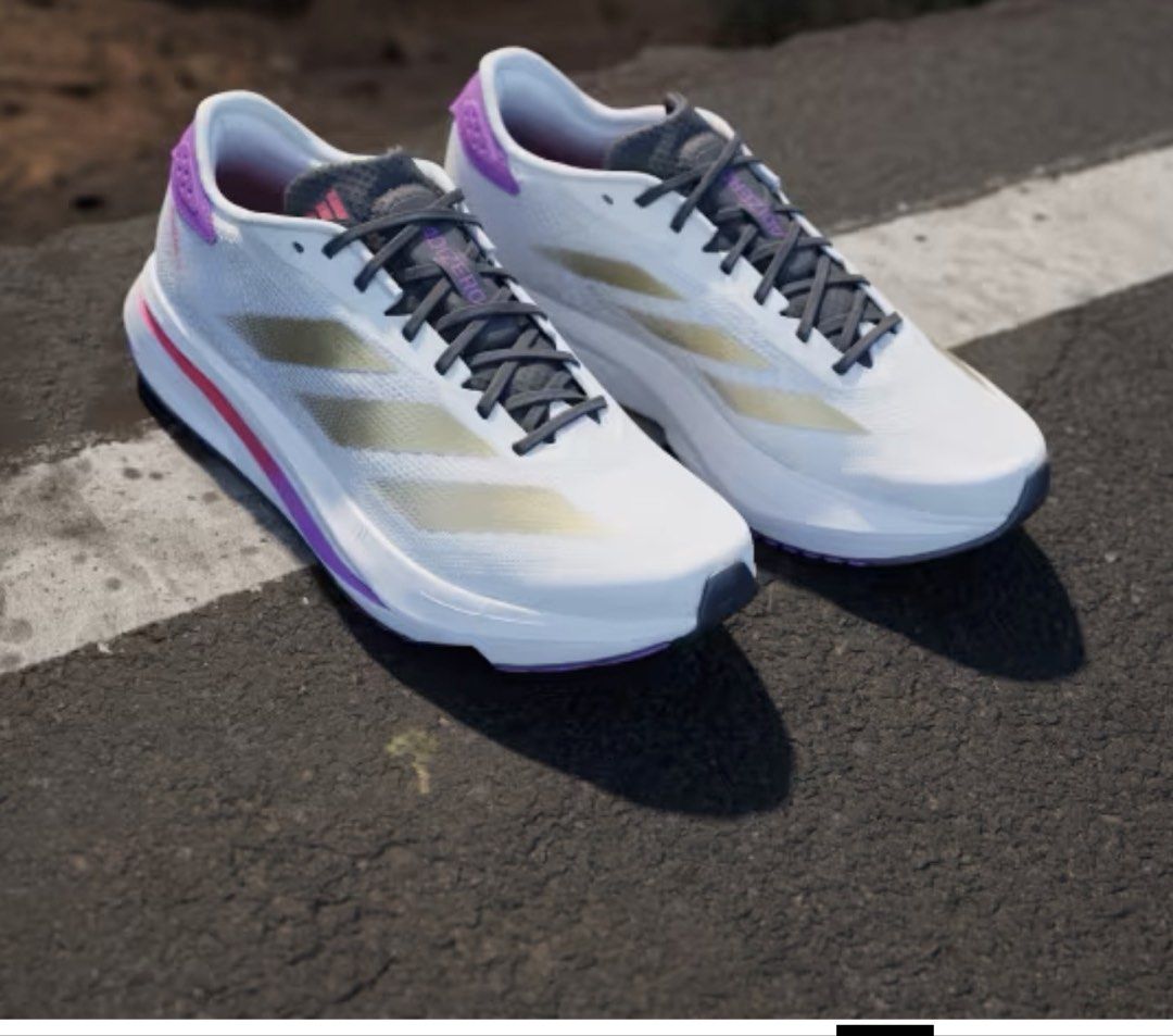 Adidas Adizero SL2 (Category: Sneakers) located in Paranaque City. Submitted by gabbyrela (Listing ID 1461568276, Image 1). Description: - Adidas SL2 - Color: White with gold stripes and purple accents - Size: 6 US Men/7.5 US Women .