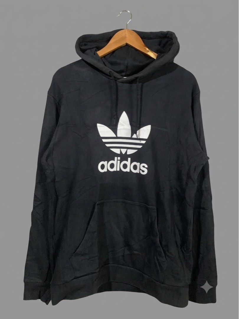 Adidas Black Hoodie (Category: Coats, Jackets and Outerwear) located in Paranaque City. Submitted by thrift_in_the_hoods (Listing ID 1461790426, Image 1). Description: Dimes: 24x26 Size: Large Issue: None .