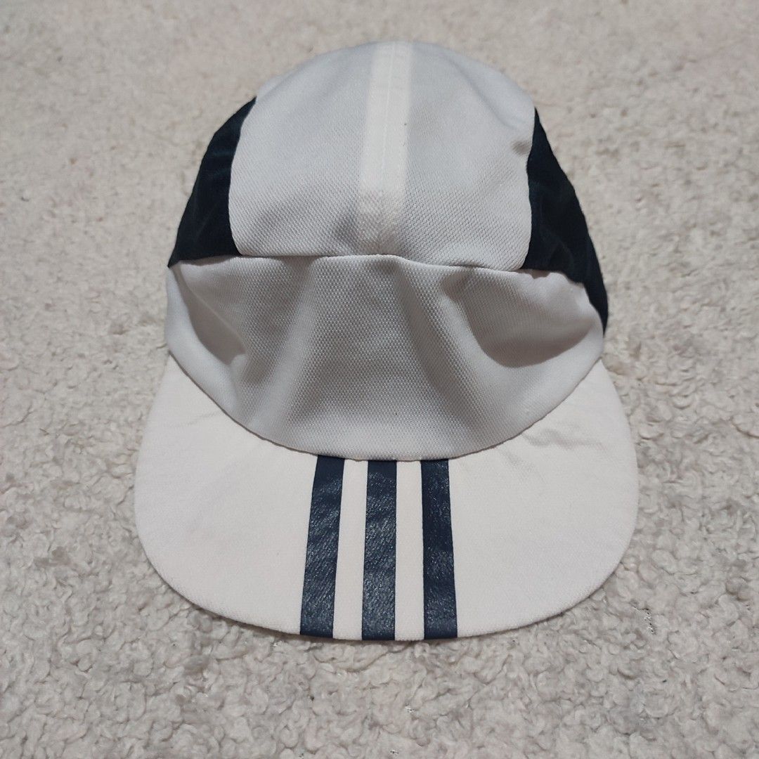 Adidas Cap White and Black (Category: Caps & Hats) located in Manila. Submitted by anthonyg01 (Listing ID 1461631315, Image 1). Description: Price: 400 pesos Condition: 9.2/10 Issues: slight yellowing of brim PM if interested or for inquiries Meetups within MANILA only Can do shipping at buyers expense.