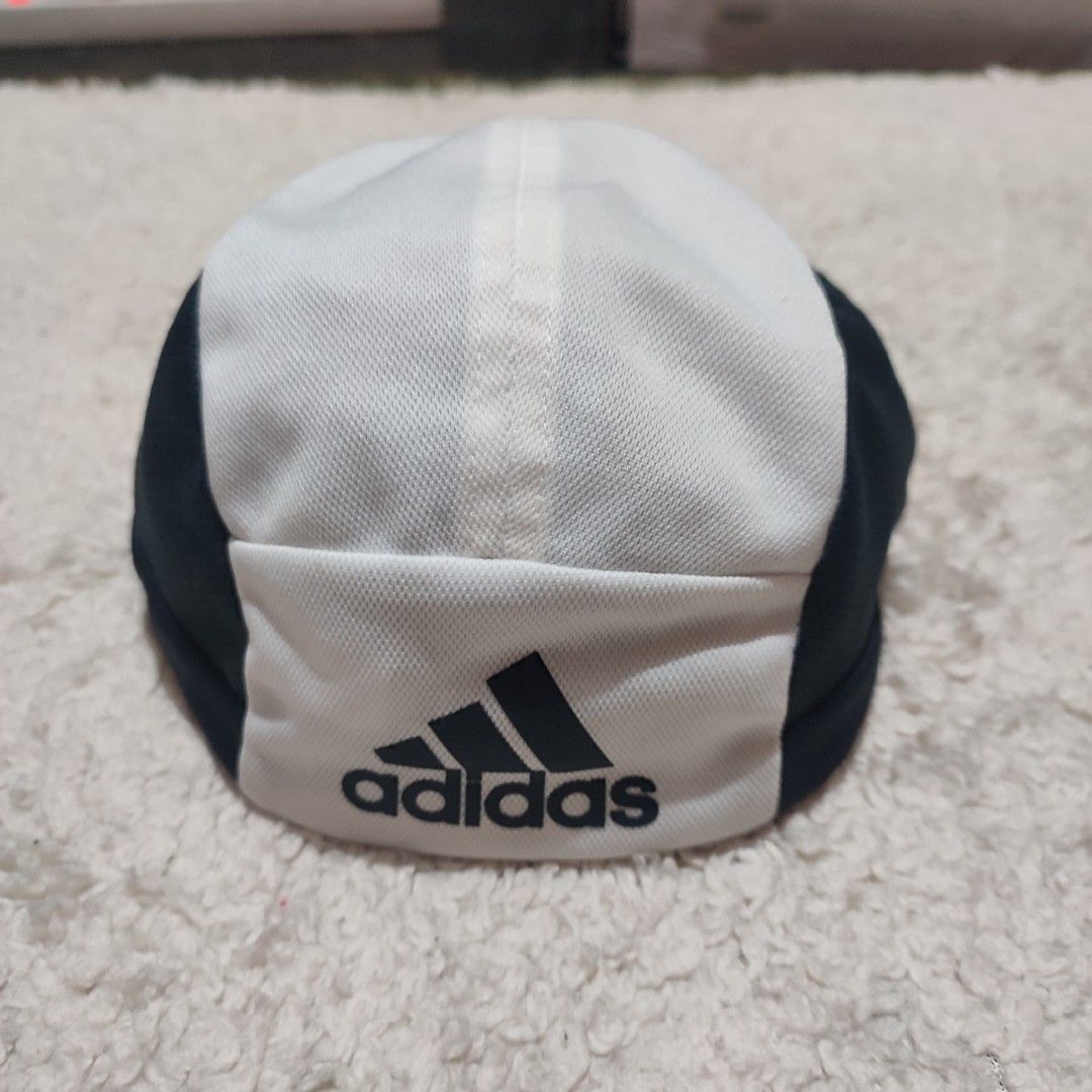 Adidas Cap White and Black (Category: Caps & Hats) located in Manila. Submitted by anthonyg01 (Listing ID 1461631315, Image 2). Description: Price: 400 pesos Condition: 9.2/10 Issues: slight yellowing of brim PM if interested or for inquiries Meetups within MANILA only Can do shipping at buyers expense.