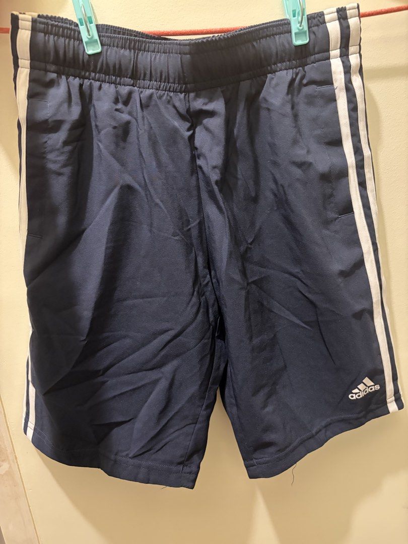 Adidas Navy Blue Shorts (Category: Babies & Kids Fashion) located in Mandaluyong City. Submitted by icheeellee (Listing ID 1461722533, Image 1). Description: Navy blue Adidas shorts Size 140 - Classic white stripes on sides - Comfortable elastic waistband.