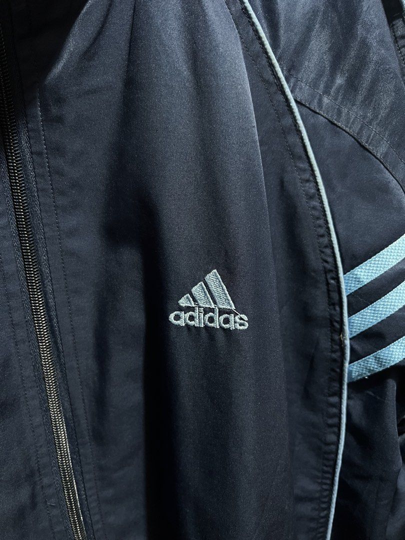Adidas Vintage Navy Blue Windbreaker (Category: Coats, Jackets and Outerwear) located in Manila. Submitted by jdstrll (Listing ID 1461647239, Image 2). Description: Adidas Vintage Navy Blue Windbreaker Width: 25 inches Length: 28 inches 🚚Mode of Delivery: J&T/Lalamove/Meet up 🫴🏼 Just Made an offer 📦We ship nationwide: Luzon/Visayas/Mindanao 🧾Mode of Payment: Gcash/Landbank/BPI/Gotyme/RCBC ✅ Shipping fee should be shouldered by the buyer. ❌No