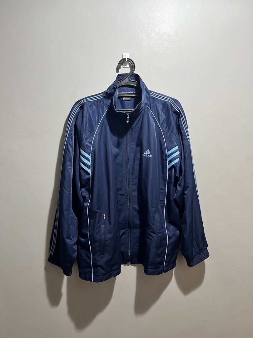 Adidas Vintage Navy Blue Windbreaker (Category: Coats, Jackets and Outerwear) located in Manila. Submitted by jdstrll (Listing ID 1461647239, Image 1). Description: Adidas Vintage Navy Blue Windbreaker Width: 25 inches Length: 28 inches 🚚Mode of Delivery: J&T/Lalamove/Meet up 🫴🏼 Just Made an offer 📦We ship nationwide: Luzon/Visayas/Mindanao 🧾Mode of Payment: Gcash/Landbank/BPI/Gotyme/RCBC ✅ Shipping fee should be shouldered by the buyer. ❌No