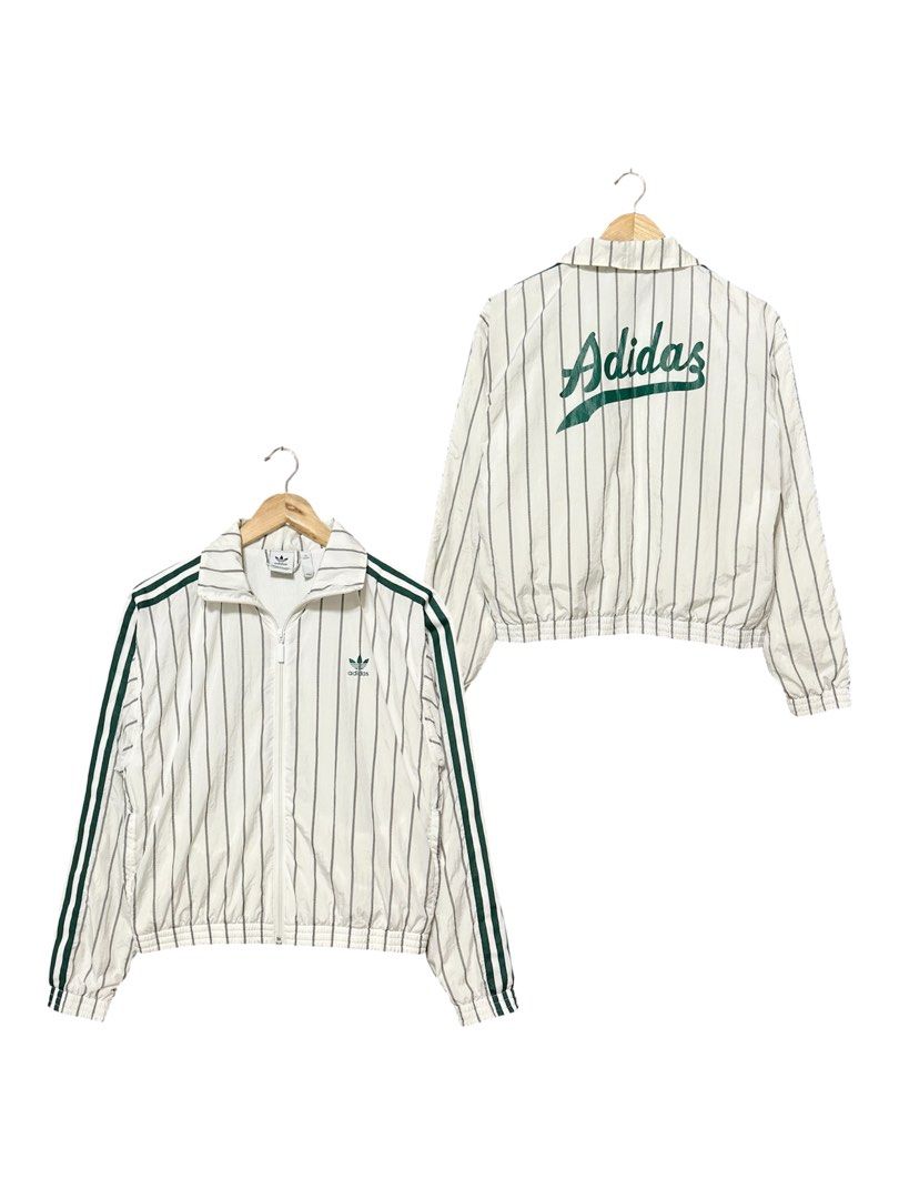 Adidas Windbreaker (Category: Coats, Jackets and Outerwear) located in Cavite. Submitted by gnthrift (Listing ID 1461575836, Image 1). Description: Adidas Stripes Windbreaker Size: M best fit Dimes: 20x21.5 Color rate: 9.8/10 Complete tags (white tag) Good as new condition. Ganda neto!! Rare finds 🙌🏻 Mine 750 + SF Location: Indang, Cavite MOP: Gcash Courier: J&T Express .