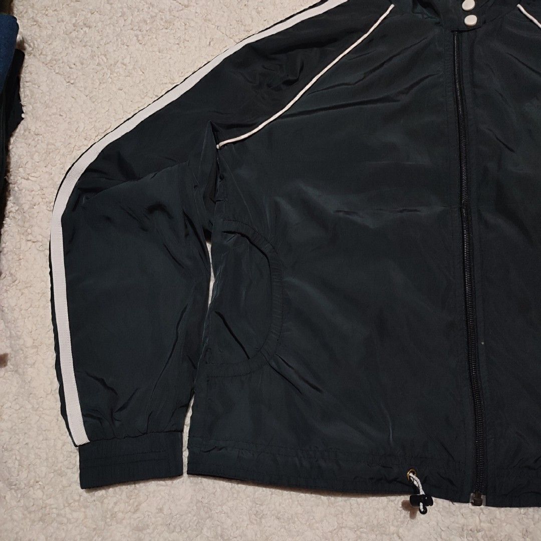 Adidas Windbreaker Jacket (Category: Coats, Jackets and Outerwear) located in Manila. Submitted by anthonyg01 (Listing ID 1461623060, Image 3). Description: Length: 22.5 inches Width: 19 inches Price: 400 pesos Condition: 9.5/10 Issues: faded logo PM if interested or for inquiries Meetups within MANILA only Can do shipping at buyers expense.