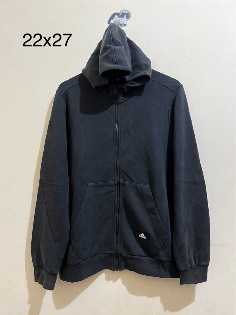 Adidas Zip-Up Hoodie (Category: Coats, Jackets and Outerwear) located in Manila. Submitted by juspheroca82034 (Listing ID 1461685627, Image 1). Description: - Black Adidas zip-up hoodie - Front zip closure - Two front pockets - Standard hoodie fabric feel - Measurements: 22" pit to pit, 27" length - Perfect for casual everyday wear.