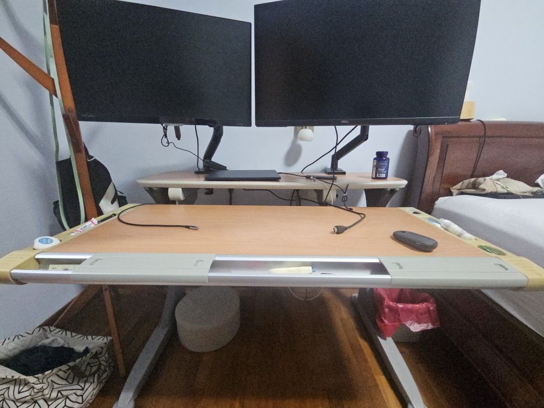 Adjustable study table (Category: Tables & Sets) located in Singapore. Submitted by tumbled0 (Listing ID 1461695359, Image 3). Description: Adjustable study table with tilt and height adjust. Approx 110x80cm Table only monitors not included Self pickup only at great world area on coming Tuesday 22 sep night..
