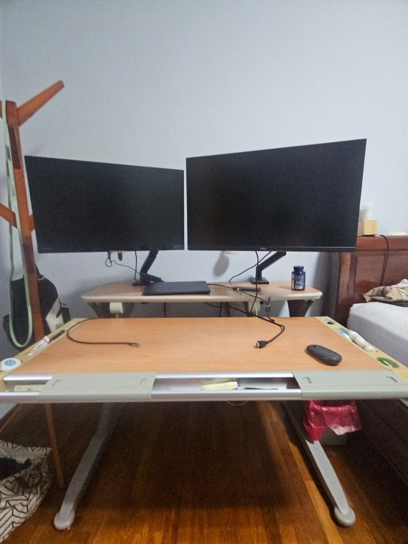Adjustable study table (Category: Tables & Sets) located in Singapore. Submitted by tumbled0 (Listing ID 1461695359, Image 2). Description: Adjustable study table with tilt and height adjust. Approx 110x80cm Table only monitors not included Self pickup only at great world area on coming Tuesday 22 sep night..