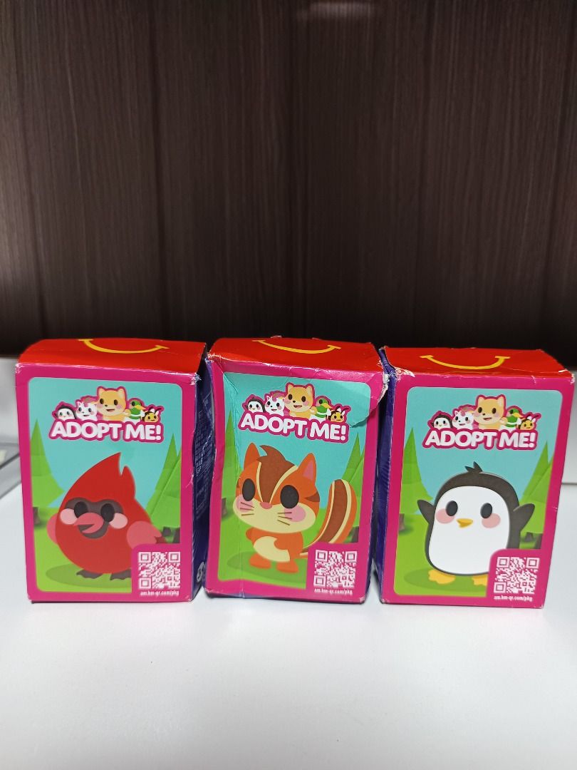 Adopt Me McDonald's Collectibles (Category: Designer & Blind Box Toys) located in Baguio. Submitted by cracklin.aniue26 (Listing ID 1461724593, Image 1). Description: - McDonald's Happy Meal Blind Box - Fun collectible toy - Perfect for 'Adopt Me!' game fans and kids - damaged box only Available: ✅Chipmunk ✅Penguin ✅Red cardinal Individual price: Php 80 each Take all for 💎Php 200.00💎 Location : Baguio City SF c/o buyer Pm for more details and i