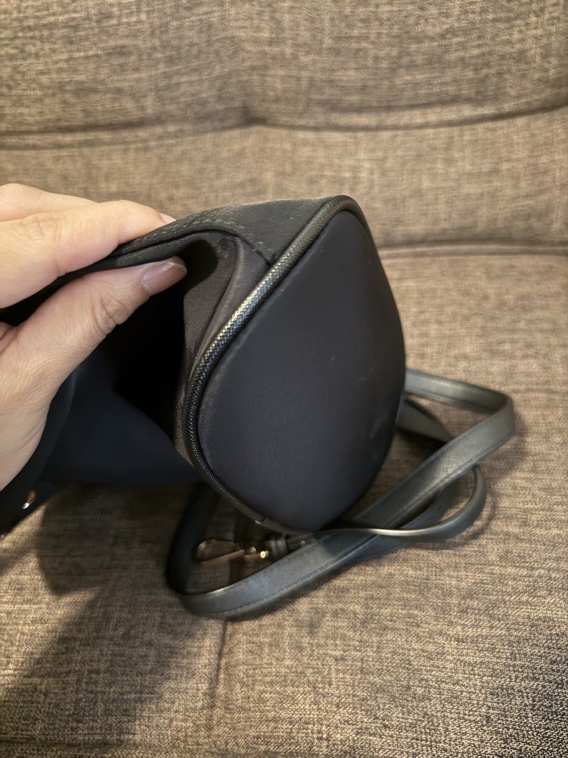 AGATHA Black Nylon Drawstring Bucket Bag with Crossbody Strap (Category: Cross-body Bags) located in Taguig. Submitted by preloved_bycarla (Listing ID 1461658590, Image 3). Description: Detachable generic crossbody strap included (old one was too thin and flimsy so I changed it) Good used condition, no flaws. Rfs: decluttering.