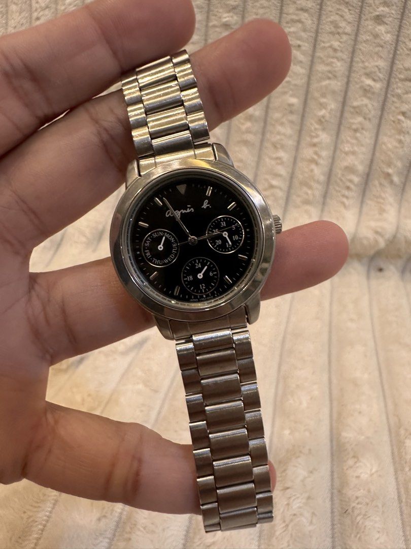 Agnes b. Multi-Function (Category: Women's Watches) located in Pasig City. Submitted by surplusatbp (Listing ID 1461565236, Image 3). Description: Agnès b. Multi-Function Description: Sophisticated designer watch featuring a classic multi-sub-dial calendar layout and a durable stainless steel build. Case Size: 34.3 mm | Wrist Size: Fits up to 15 cm Features & Selling Points: * Clean black dial signed with the signature Parisian fashion house bran