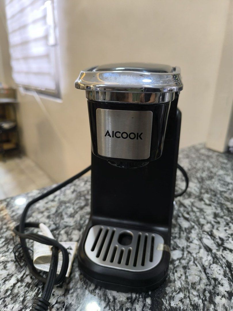 Aicook Single-Serve K-Cup Pod Coffee Maker (Compact Design (Category: Coffee Machines & Makers) located in Meycauayan. Submitted by treizie (Listing ID 1461680020, Image 1). Description: READ DESCRIPTION CAREFULLY ‼️ PRE-OWNED, Used only a few times. Brand: AicookType: Single-Serve / Single Cup Coffee Pod MachinePower Rating: 120V / 60Hz / 800W (Please note: This is a US voltage unit. You will need a step-down transformer to use it safely on stan