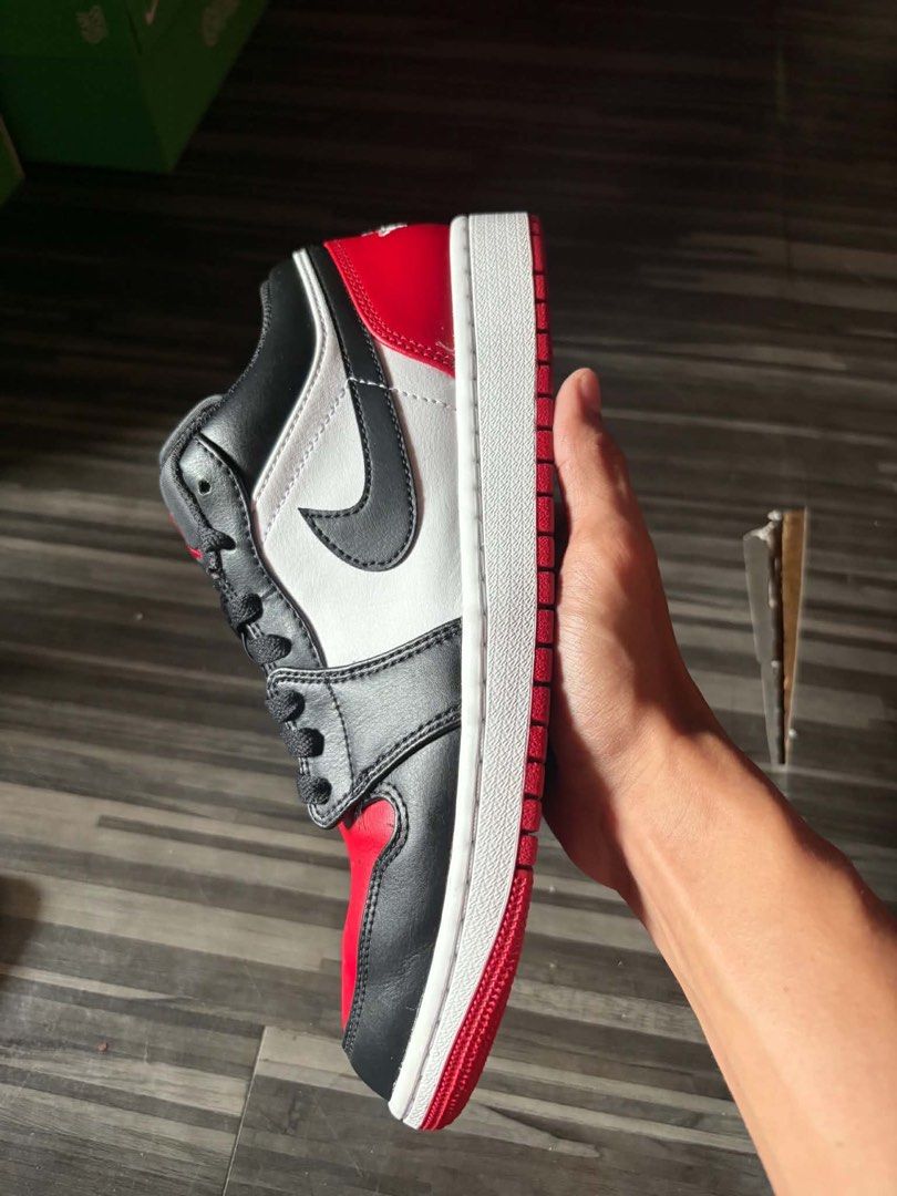 Air Jordan 1 Low White Black Varsity Red (authentic) (Category: Sneakers) located in Quezon City. Submitted by albertojay09 (Listing ID 1461653490, Image 3). Description: - Classic Jordan 1 Lows - Colorway: White, Black, and Varsity Red - Size: 9.5 US Men's - Comes with original box - Essential addition to any sneaker collection.