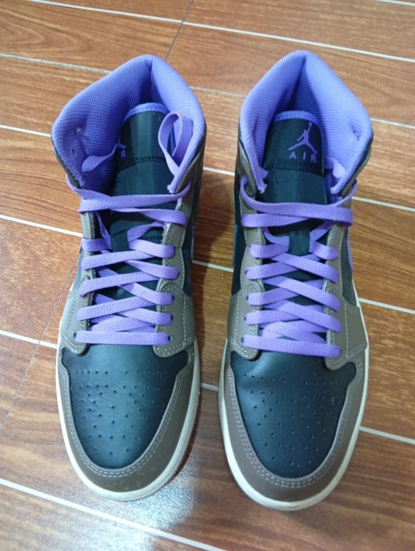 Air Jordan 1 Mid (Palomino) (Category: Sneakers) located in Caloocan City. Submitted by grandmountain_ca5a79 (Listing ID 1461636757, Image 2). Description: - Authentic Air Jordan 1 Mid SE 'Purple Court' - Stylish colorway: Mix of brown, black, and purple - Vibrant purple laces for a pop of color - Ideal for casual wear and everyday outfits - Please check all photos for detailed condition - No box included.