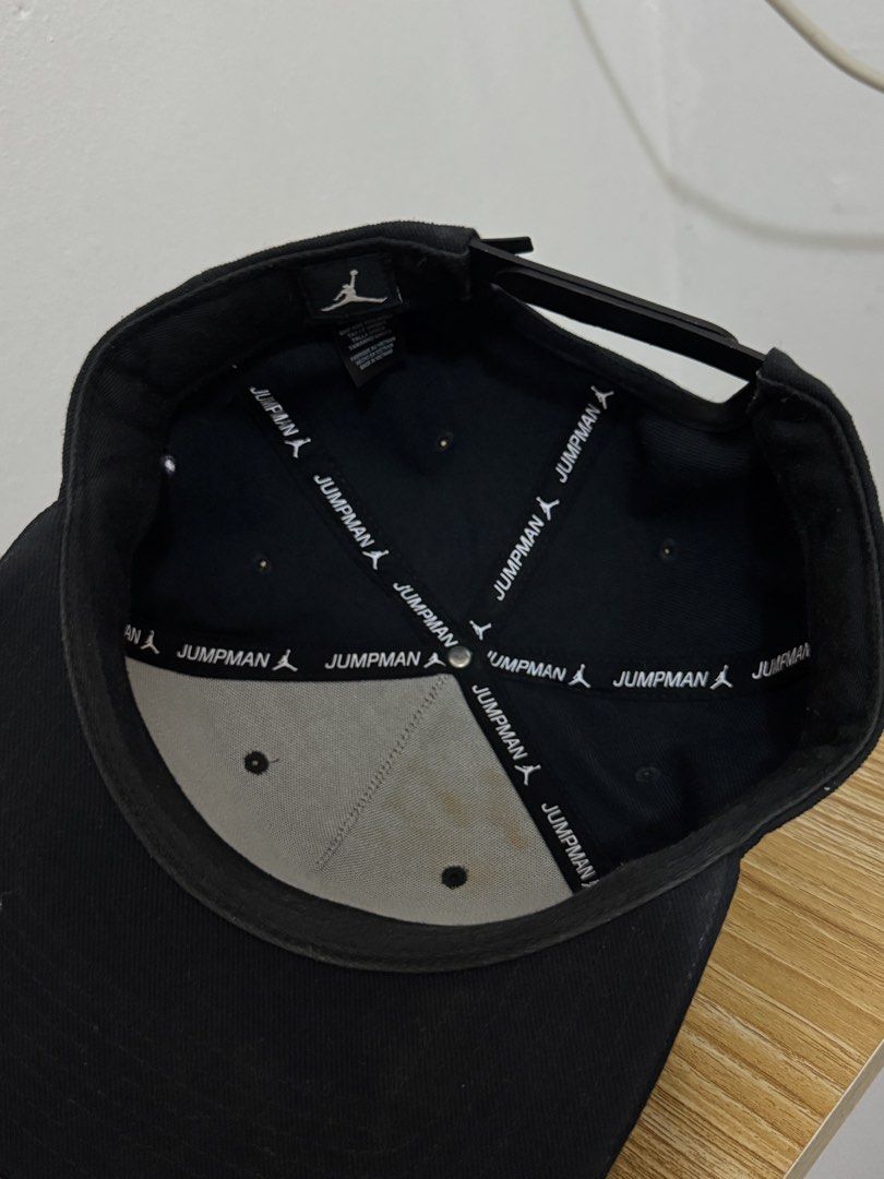 Air Jordan Snapback Cap (Category: Caps & Hats) located in Bulacan. Submitted by alshopie (Listing ID 1461630432, Image 2). Description: - Black Air Jordan cap - Features blue and purple Jumpman logo - Jumpman logo also on the side - Adjustable snapback closure - Perfect for Jordan fans - Note: Shows some signs of wear on the inside.