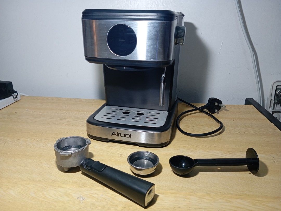 Airbot Espresso Machine with Accessories (Category: Coffee Machines & Makers) located in Kota Bharu. Submitted by mhakeems (Listing ID 1461663154, Image 3). Description: - Airbot Espresso Machine - Includes portafilter, tamper, and two filter baskets - Detachable water tank for easy refilling - Tested and confirmed working - Ideal for brewing delicious coffee at home - Selling as I've upgraded my coffee setup.