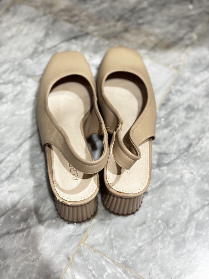 ALBERTO Beige Slingback Block Heels (Category: Heels) located in Bauang. Submitted by jeneefromtheblock (Listing ID 1461771588, Image 3). Description: - Cute beige slingback heels - Comfortable low block heel, great for walking - Adjustable strap at the back for a secure fit - Stylish square toe design - Versatile neutral color, perfect for work or casual outings.