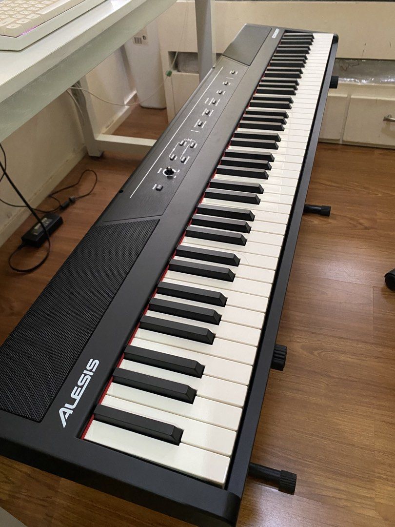 Alesis Digital Piano with Stand (Category: Musical Instruments) located in Las Pinas. Submitted by ananabs (Listing ID 1461639266, Image 1). Description: - with free dust cover and stand. comes with original PSU, music sheet rest, and manual. - 100% functionality and cosmetics. - full-size 88 keys - semi-weighted - touch response - 20W speaker system - 10 built-in voices: acoustic piano, bright piano, electric piano, harpsichord, drawbar organ, c