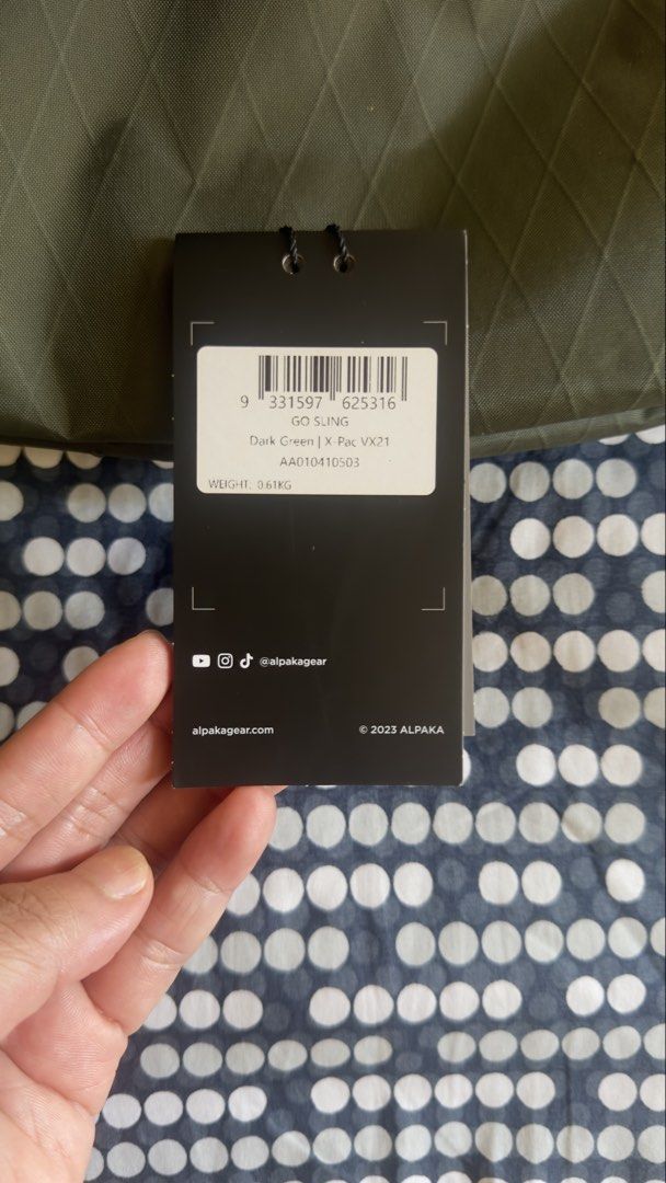 Alpaka Go Sling XPac (Category: Sling Bags) located in Caloocan City. Submitted by knackknicks (Listing ID 1461736616, Image 2). Description: - Brand: Alpaka - Model: Go Sling - Material: XPac (Dark Green) - Weight: 0.61kg - Condition: Excellent, like new - Features: Durable, lightweight, perfect for everyday carry - Meetup locations: SM North, Ayala Malls Trinoma.