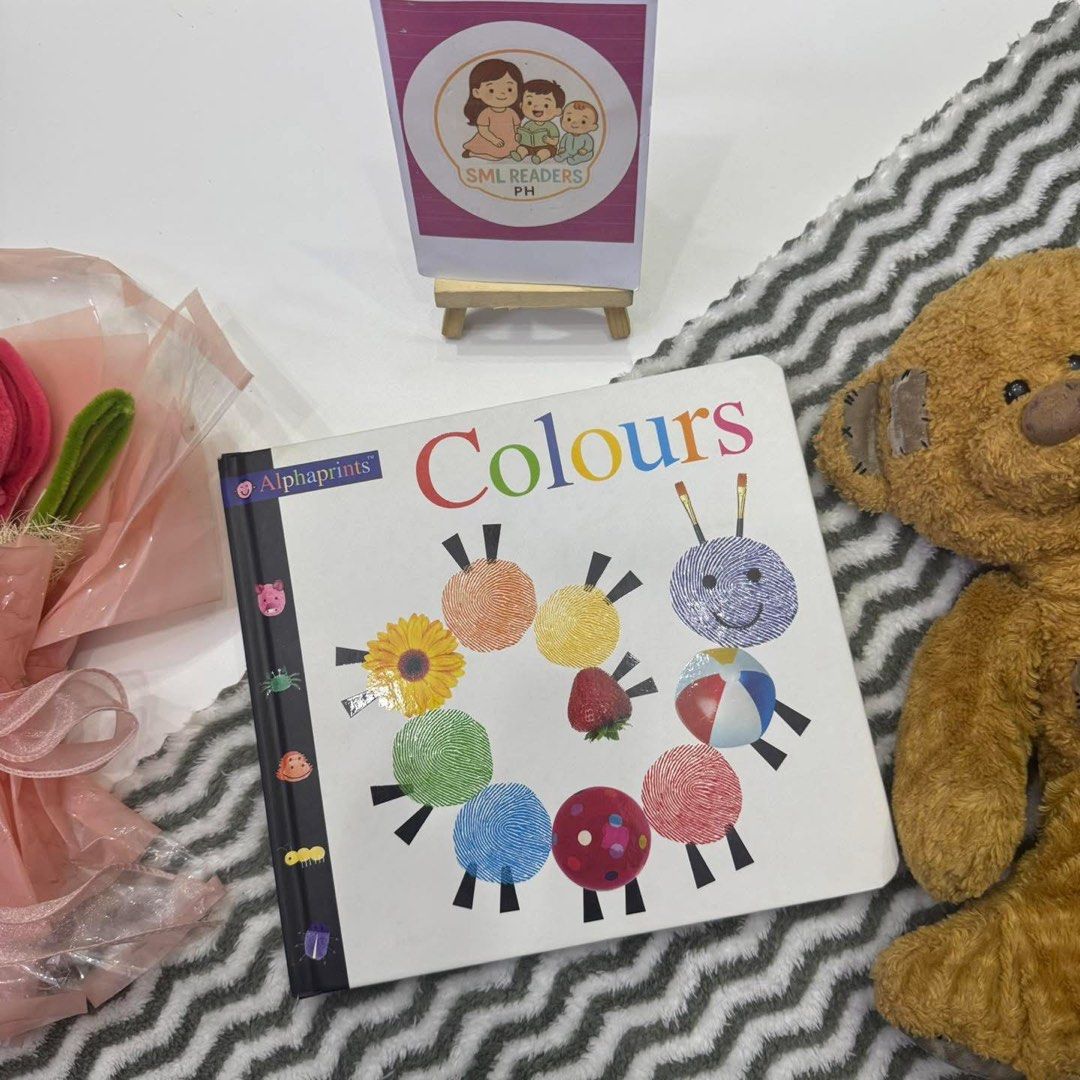 Alphaprints Colours (Category: Children's Books) located in Taguig. Submitted by smlreadersph (Listing ID 1461738183, Image 1). Description: 💗 𝐀𝐥𝐩𝐡𝐚𝐩𝐫𝐢𝐧𝐭𝐬 𝐄𝐝𝐮𝐜𝐚𝐭𝐢𝐨𝐧𝐚𝐥 𝐁𝐮𝐧𝐝𝐥𝐞 🐾🔤 Hardcover Boardbooks 📖 Condition: Preloved hardcover boardbooks; sturdy and perfect for little hands with few usual signs of use. 👧👦 Age Recommended: 1–4 years 📘 About the Books: Make early learning extra fun with Alphaprints! ✨ Using cle