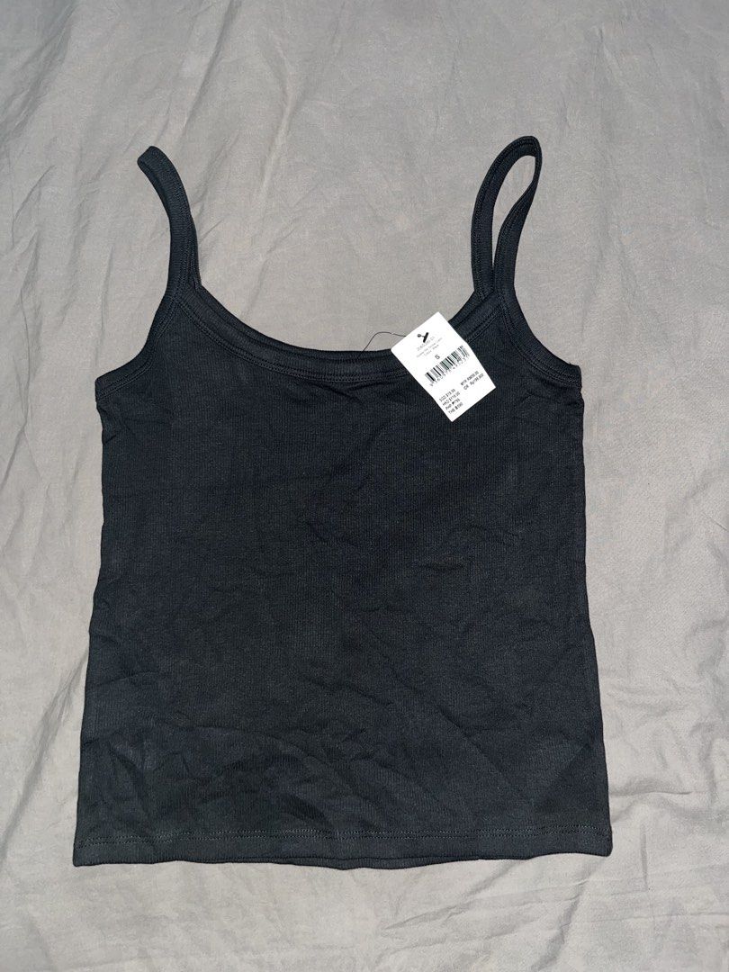 American Eagle Black Ribbed Tank Top Size S (Category: Sleeveless) located in Cabuyao City. Submitted by 2fa63c18159f66dd6009285b88b3f7 (Listing ID 1461592430, Image 1). Description: - Brand: American Eagle - Type: Ribbed Tank Top - Color: Black - Straps: Spaghetti - Size: S - Condition: Brand new with tag - Features: Versatile basic, can be dressed up or down ྀིྀི MOD: GCash / MariBank/ GoTyme .