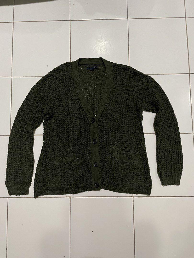 American Eagle V-neck Button Down Cardigan (Category: Coats, Jackets and Outerwear) located in Dasmarinas. Submitted by angieee1208 (Listing ID 1461615504, Image 1). Description: - Size: med - large - Color: olive green - Condition: has small hole on left back sleeve, washed - Color may vary due to lighting - DM for questions - Shipping fee shouldered by buyer - MOP: Paymaya, GoTyme, Gcash.
