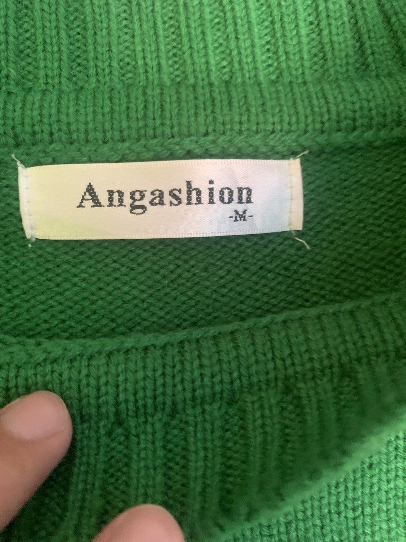 Angashion Green Leopard Print Knit Sweater (Category: Longsleeves) located in Cabuyao City. Submitted by st.michael.grc (Listing ID 1461614594, Image 2). Description: - Green knit sweater with cream sleeves - Bold leopard head design on front - Leopard print on sleeves - Crew neck, long sleeves - Ribbed cuffs and hem - Perfect statement piece DM for more details!.
