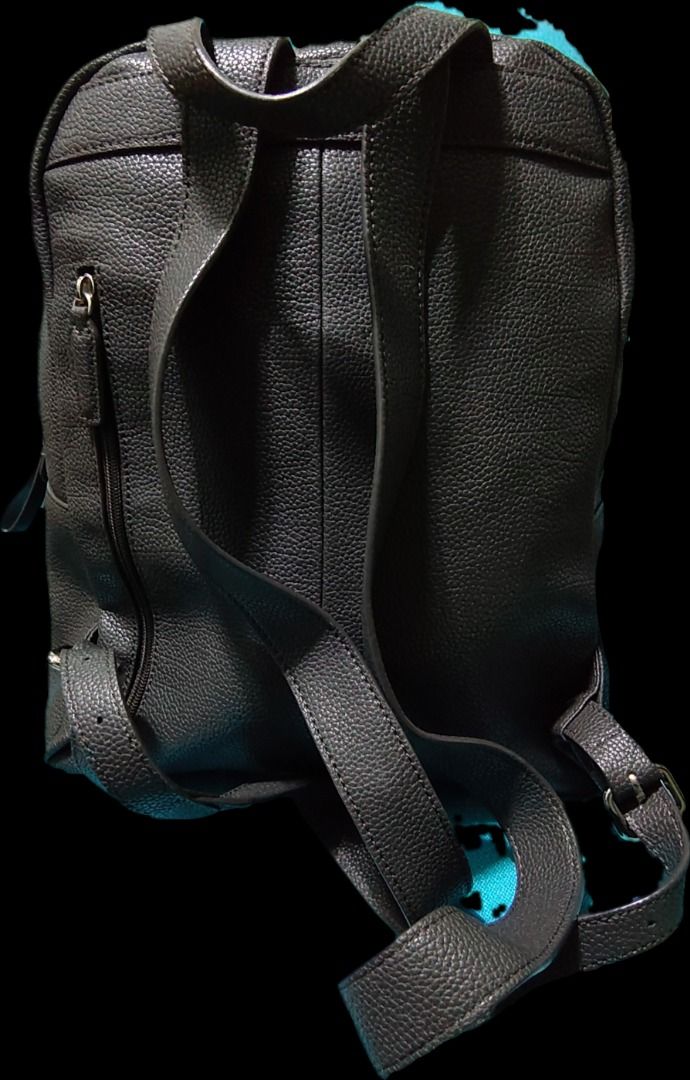Anne Klein Black Pebble Leather Backpack (Category: Backpacks) located in Caloocan City. Submitted by jpmshoppe (Listing ID 1461673092, Image 2). Description: - Black Anne Klein backpack - Pebble leather texture - Front zip pocket - Main zip compartment - Interior zip pocket - Interior slip pocket - Adjustable straps - Ideal for everyday use.