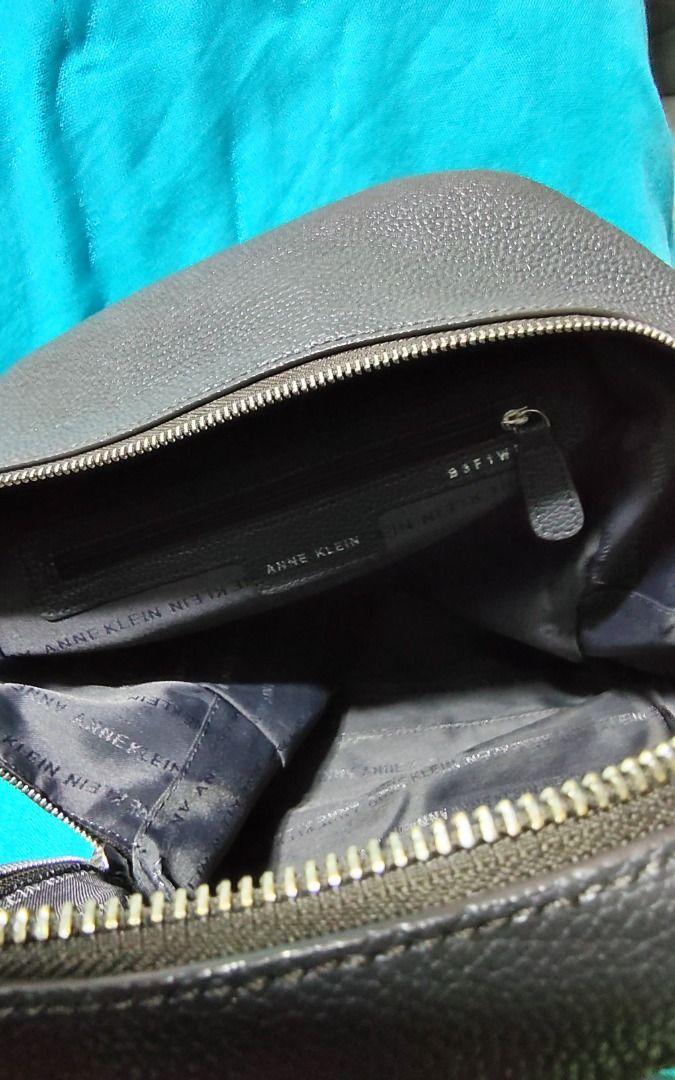 Anne Klein Black Pebble Leather Backpack (Category: Backpacks) located in Caloocan City. Submitted by jpmshoppe (Listing ID 1461673092, Image 3). Description: - Black Anne Klein backpack - Pebble leather texture - Front zip pocket - Main zip compartment - Interior zip pocket - Interior slip pocket - Adjustable straps - Ideal for everyday use.
