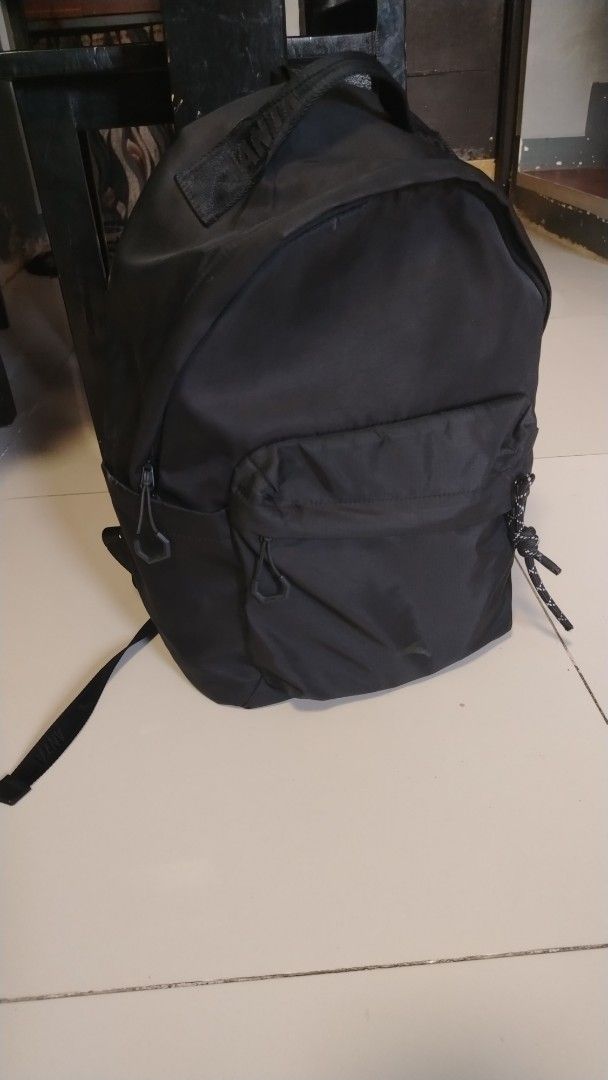 anta Black Backpack with Multiple Pockets (Category: Backpacks) located in Manila. Submitted by wildwind_73f77a (Listing ID 1461570596, Image 1). Description: - Durable black backpack - Main compartment with zipper - Front pocket with zipper - Side pockets - Padded straps for comfort - Ideal for school or travel - Clean inside and out - Ready for a new owner.