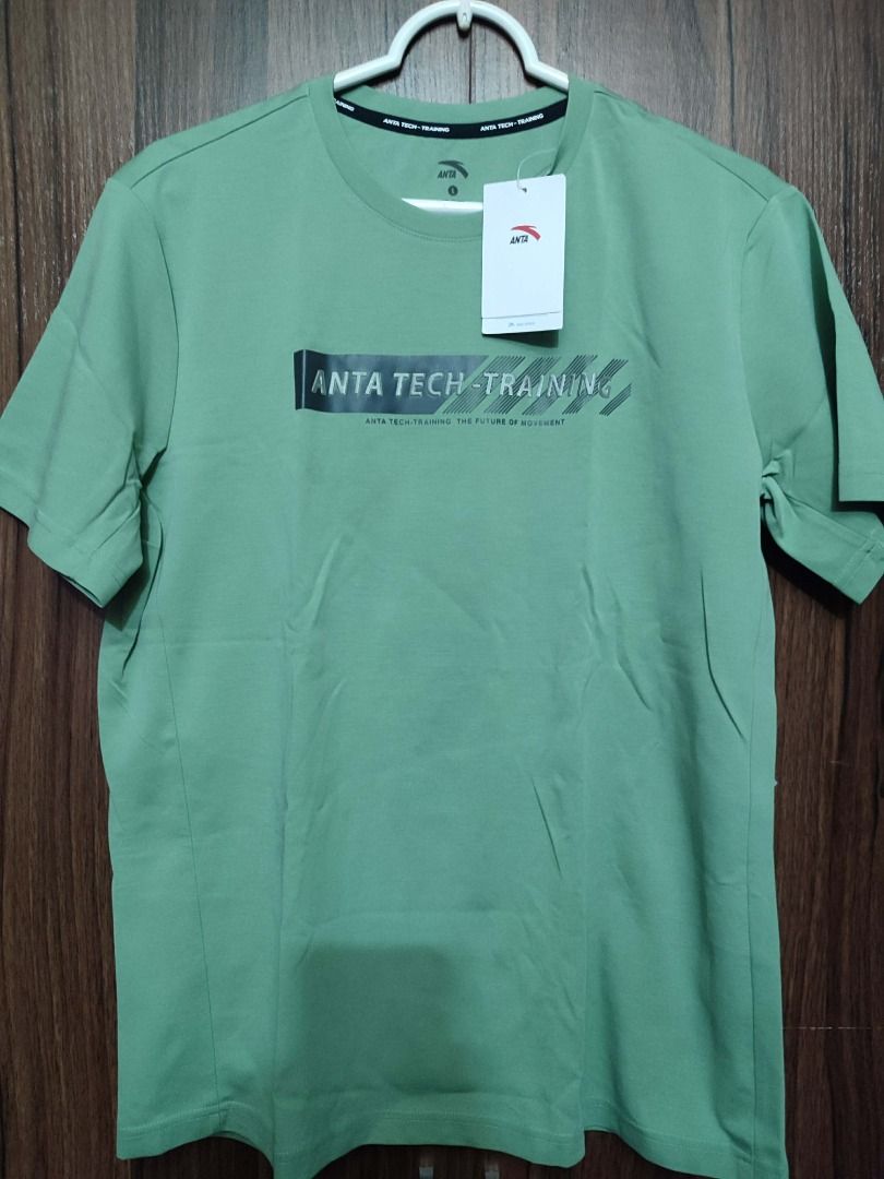 ANTA TECH-TRAINING T-Shirt Green Size L (Category: Activewear) located in Mandaluyong City. Submitted by happystar.f17880 (Listing ID 1461628502, Image 3). Description: - Brand new ANTA t-shirt - Size: Large (L) - Features 'ANTA TECH-TRAINING' graphic on the front - Includes 'ANTA TECH-TRAINING THE FUTURE OF MOVEMENT' text - Original tag still attached - Price is slightly negotiable 📍 LOCATION Mandaluyong City 💳 PAYMENT OPTIONS • GCash • GoTyme