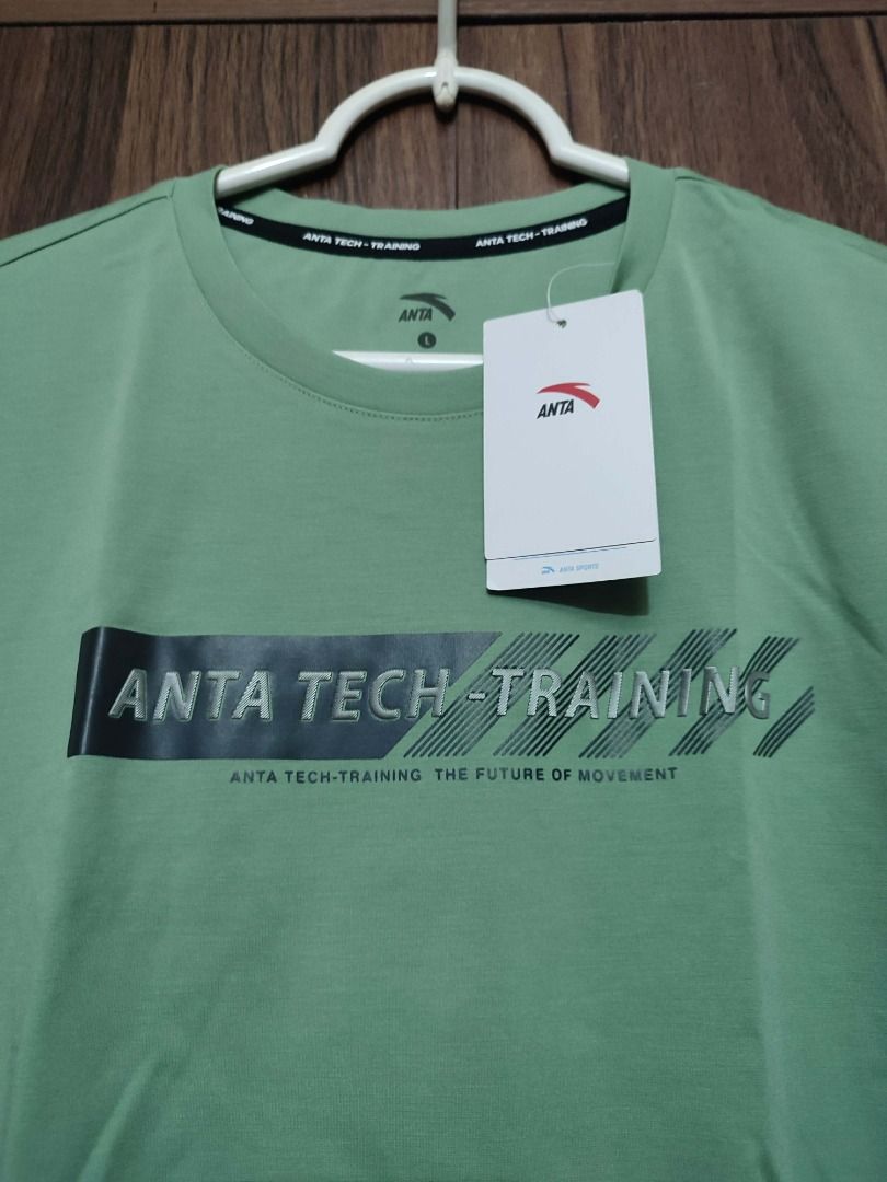 ANTA TECH-TRAINING T-Shirt Green Size L (Category: Activewear) located in Mandaluyong City. Submitted by happystar.f17880 (Listing ID 1461628502, Image 2). Description: - Brand new ANTA t-shirt - Size: Large (L) - Features 'ANTA TECH-TRAINING' graphic on the front - Includes 'ANTA TECH-TRAINING THE FUTURE OF MOVEMENT' text - Original tag still attached - Price is slightly negotiable 📍 LOCATION Mandaluyong City 💳 PAYMENT OPTIONS • GCash • GoTyme