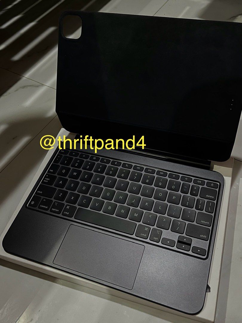 Apple Magic Keyboard for iPad Pro 11” M4 / M5 (Black) (Category: iPad) located in Tuguegarao City. Submitted by thriftpand4 (Listing ID 1461686382, Image 3). Description: Almost brand new! - No scratches - Protective film installed -All keys working - All backlight working - Box included (Serial# is the same) Never really used it much, and I covered it with a protective film on the outside the moment I had it. It has no scratches, even the trackp