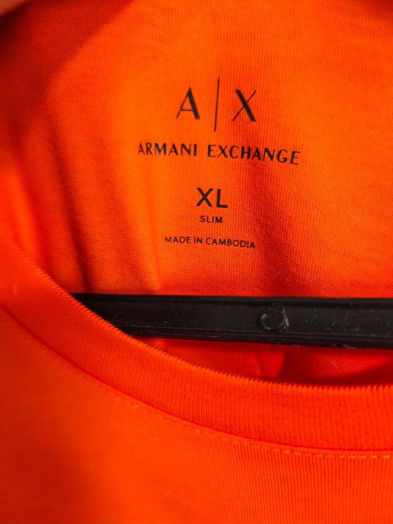 Armani Tees (Category: Tshirts & Polo Shirts ) located in Caloocan City. Submitted by purefalcon.974eee (Listing ID 1461603800, Image 3). Description: Brand new Armani Exchange Orange Tee with Logo on front and Back.