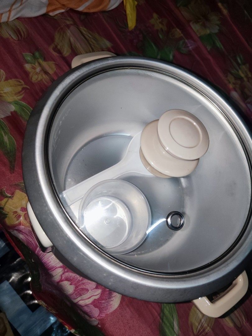 Asahi Rice Cooker RC-87 (Category: Cookers) located in Quezon City. Submitted by cxtian055 (Listing ID 1461589380, Image 2). Description: - Asahi Rice Cooker - Includes glass lid and measuring cup - Simple one-switch operation for cook and warm functions - Ideal for daily use - Clean and well-maintained, ready for its new home.